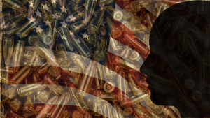 a ghostly layer of bullets are visible over the folds of a brightly red white and blue American flag